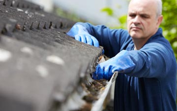 cleaning and inspecting Second Coast roofs